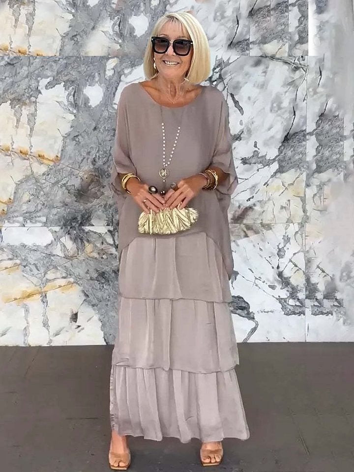 Women's summer dress: tiered ruffles, batwing sleeves, elegant cocktail style.