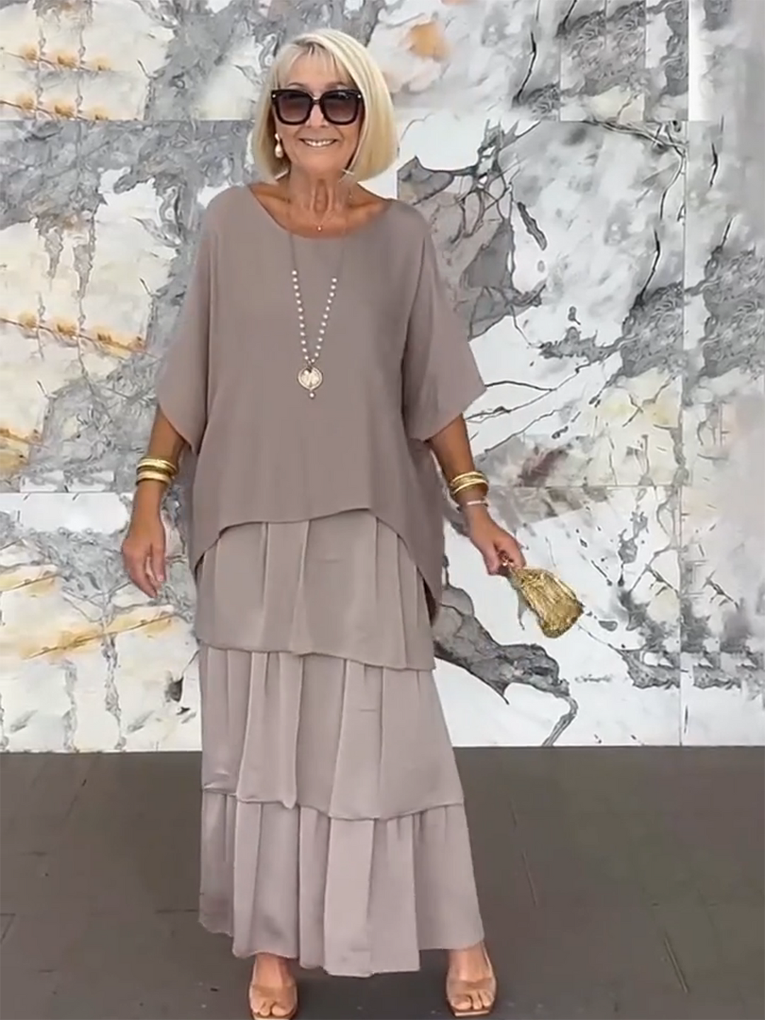 Sophisticated women's fashion: tiered ruffle batwing sleeve maxi dress.