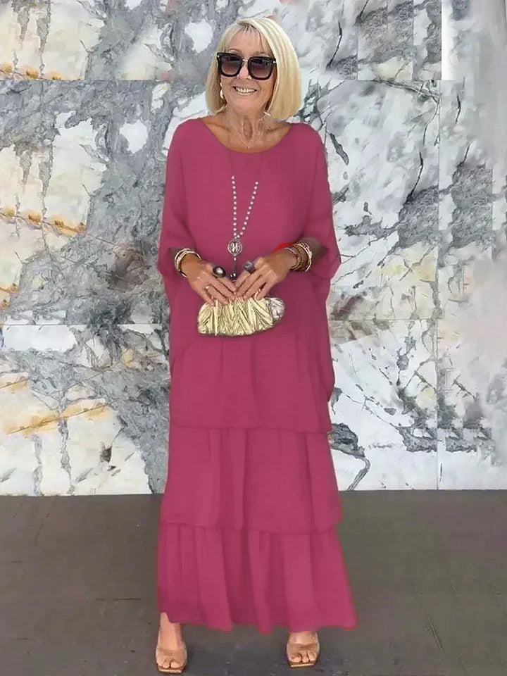 Graceful women's tiered ruffle batwing sleeve evening gown for special events.