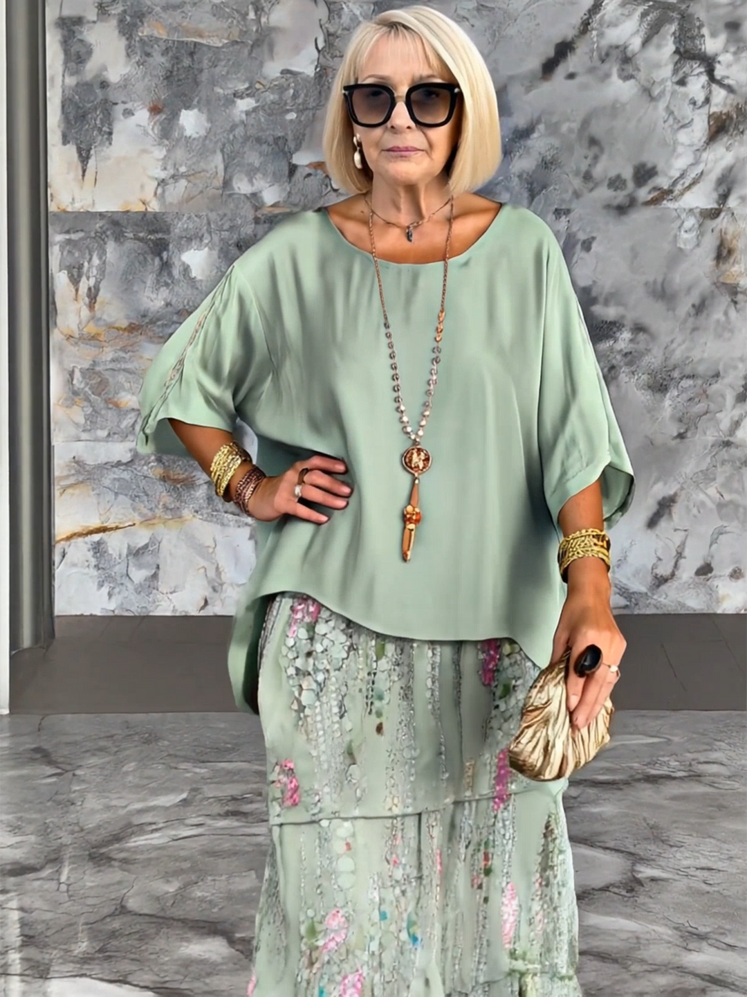 Chic women's tiered ruffle party dress featuring unique batwing sleeves.