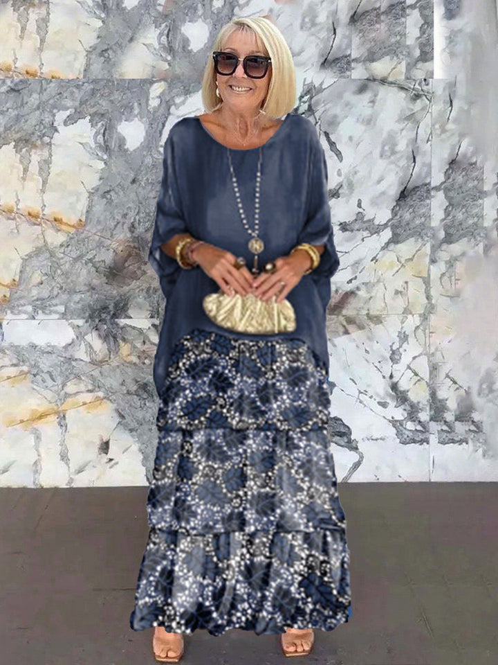 Sophisticated women's evening gown: tiered ruffles, batwing sleeves, perfect for events.