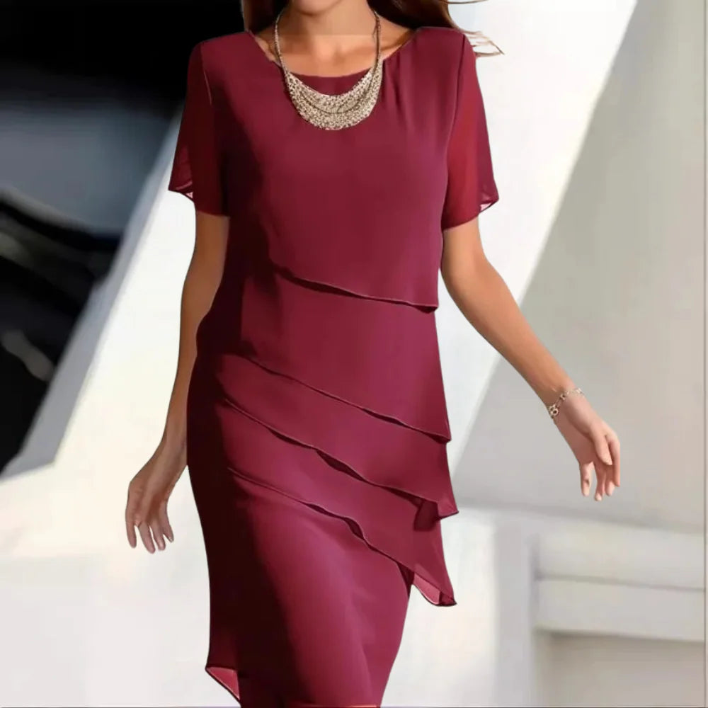 Elegant women's red midi dress with short sleeves & round neck, perfect for summer occasions & chic events.