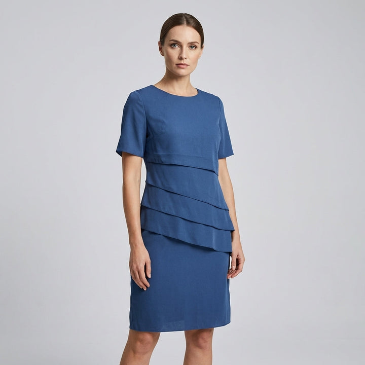 Stylish women's pink midi dress with short sleeves, round neck & flattering fit, suitable for versatile occasions.