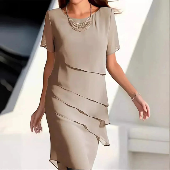 Elegant beige short-sleeve midi dress for women, offering a flattering fit & chic style for any special occasion.