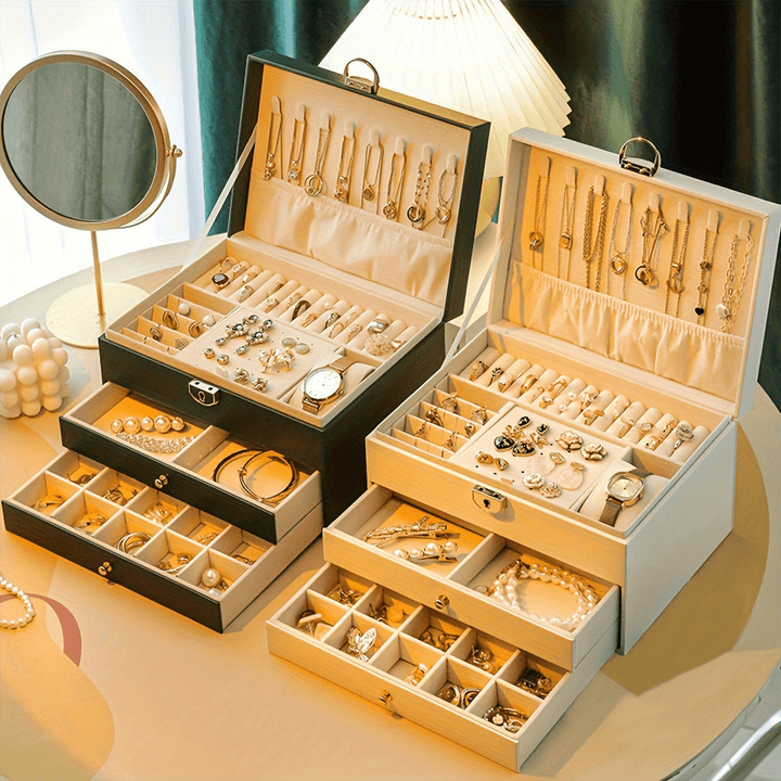 Protective white travel jewelry storage box for women's necklaces, rings, & earrings.