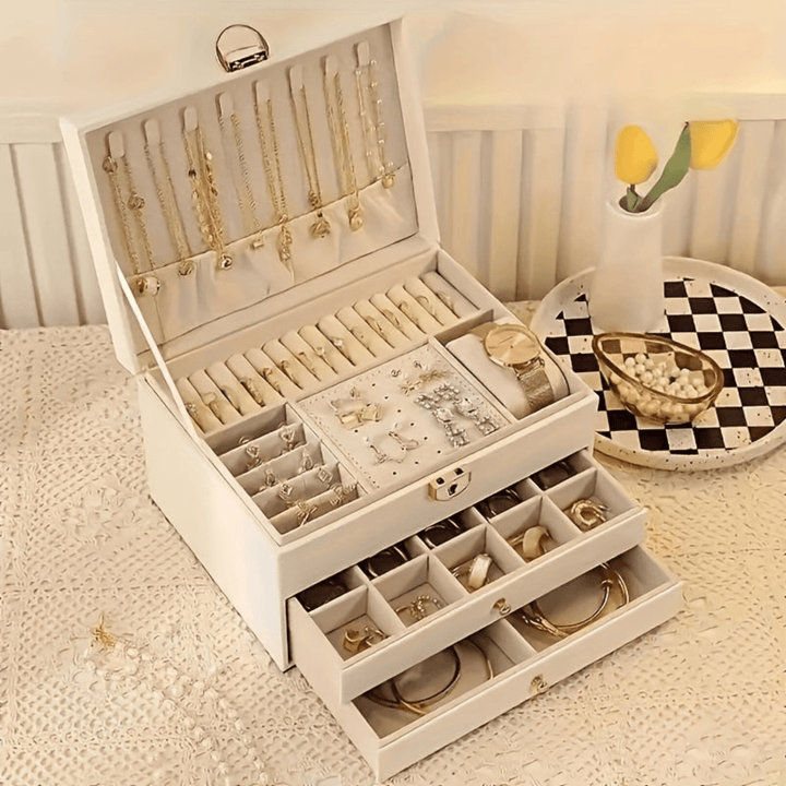 Sleek black luxury jewelry organiser box, soft interior lining protecting precious necklaces & rings.