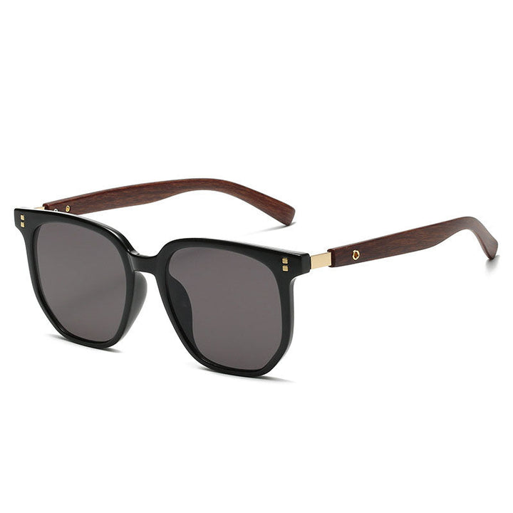 Stylish unisex vintage sunglasses in midnight black with silver lenses. Lightweight design offers UV protection & comfort.