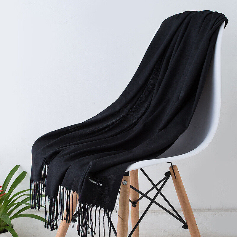 Luxurious long cashmere scarf for women, soft and warm winter fashion accessory.