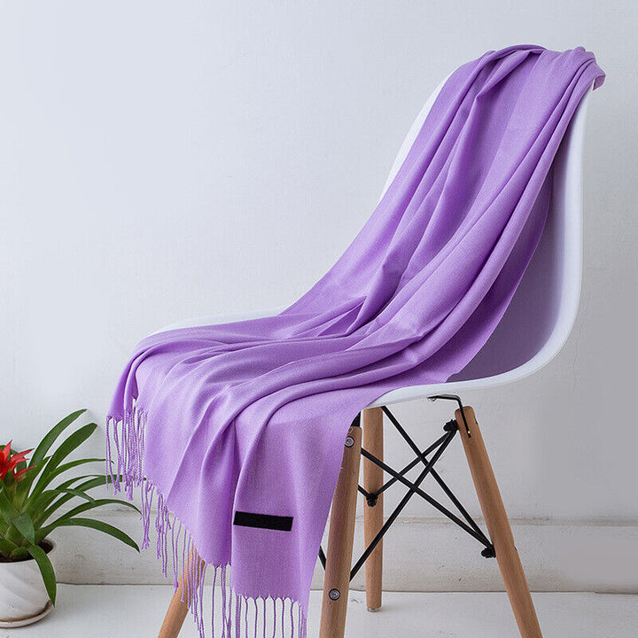 Women's elegant long cashmere shawl scarf, ideal for warmth and style in winter.