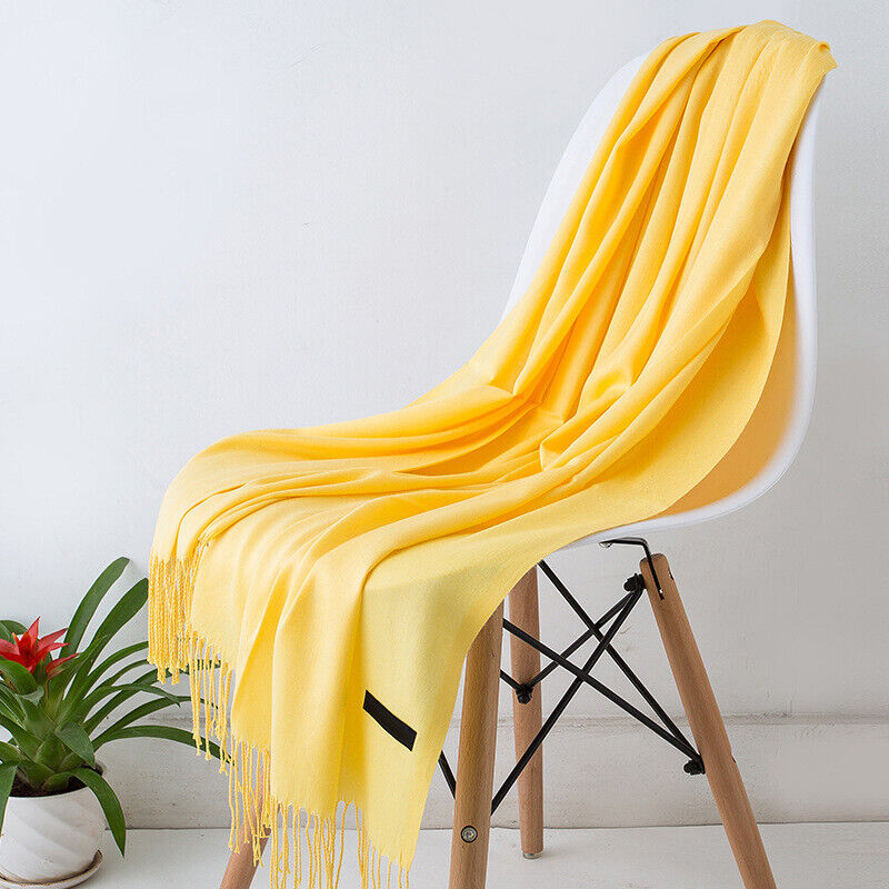 Versatile women's long cashmere scarf, doubles as a soft, warm winter shawl accessory.