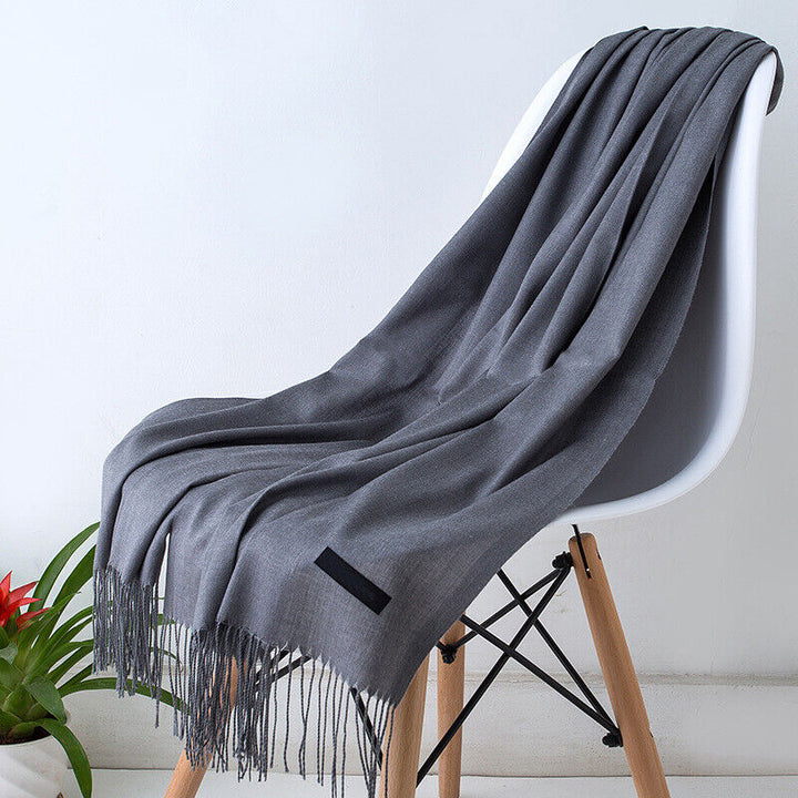 Soft and stylish women's long cashmere scarf for winter fashion and warmth.