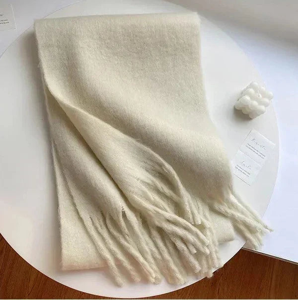 Modern women's cashmere scarf, a stylish and warm fall fashion accessory.
