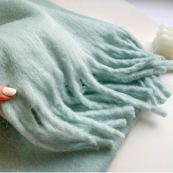 Cozy Eloise cashmere scarf for women, soft, luxurious, and warm.