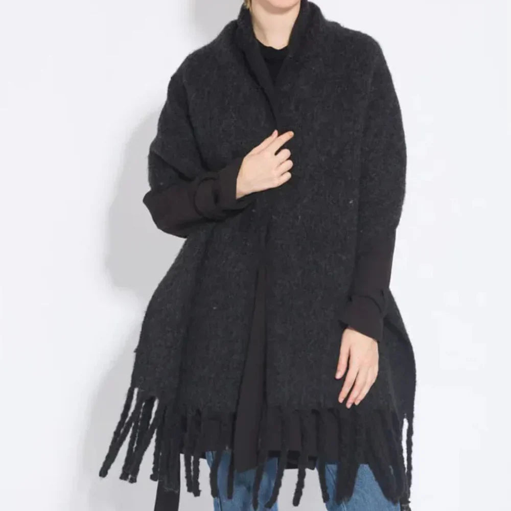 Elegant plain cashmere scarf for women, perfect for any fall or winter outfit.
