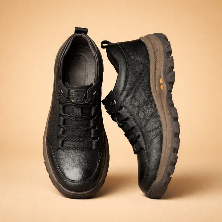 Comfortable men's walking shoes, hand-stitched for ergonomic support, ideal for versatile everyday casual wear.