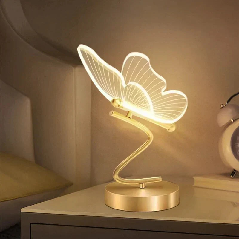 Modern butterfly LED desk lamp, elegant table light for home office decor & task lighting.