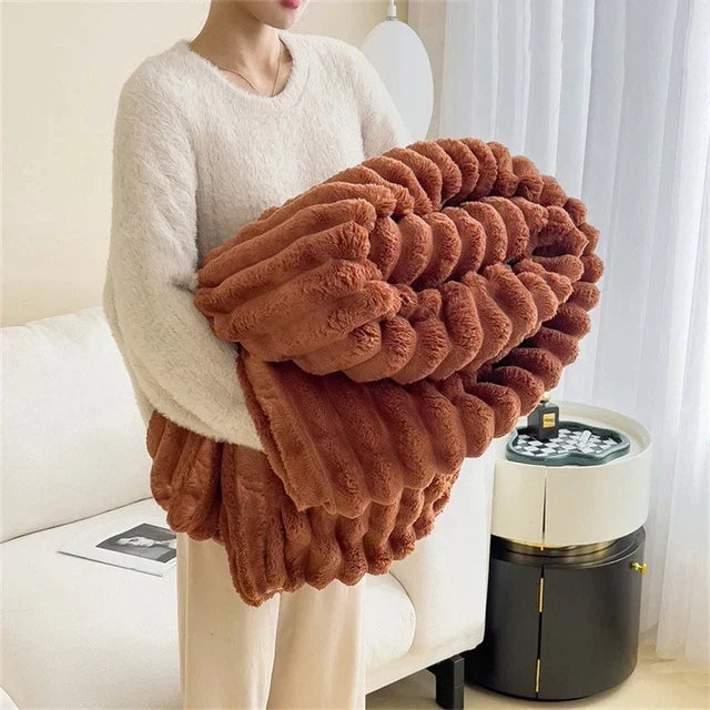 Indulge in ultimate warmth with this luxurious, soft plush CozyWrap comfort blanket for relaxation.