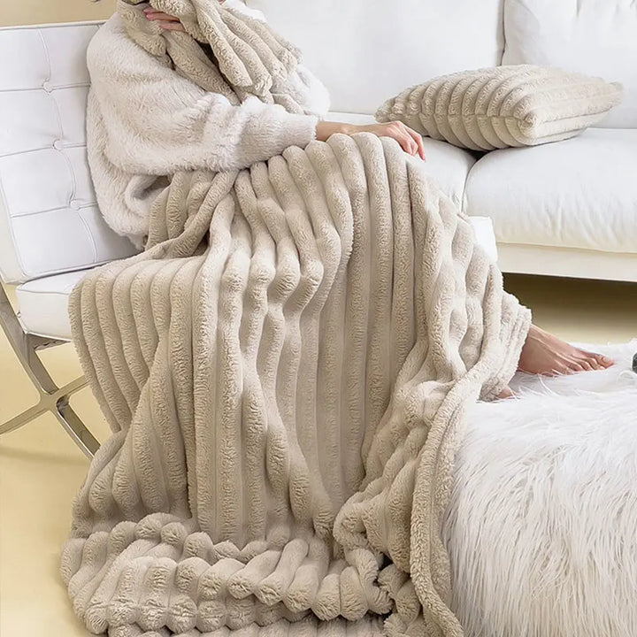 Luxury plush blanket, ultra-soft CozyWrap for ultimate comfort and warmth in any home.