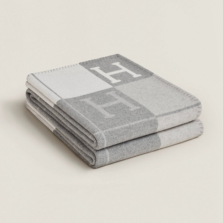 Enhance your decor with this exquisite gold cashmere wool throw.