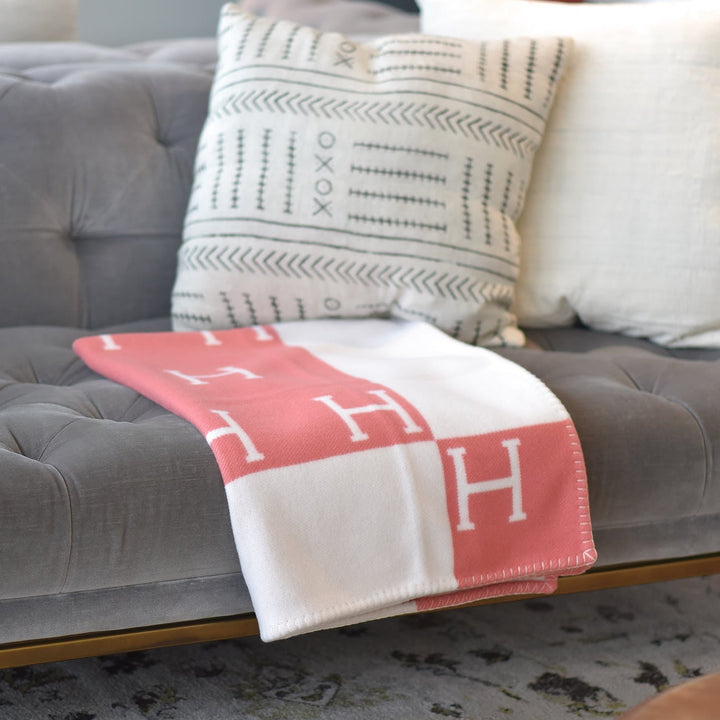 Handcrafted gold wool blanket, a sophisticated home accent piece.