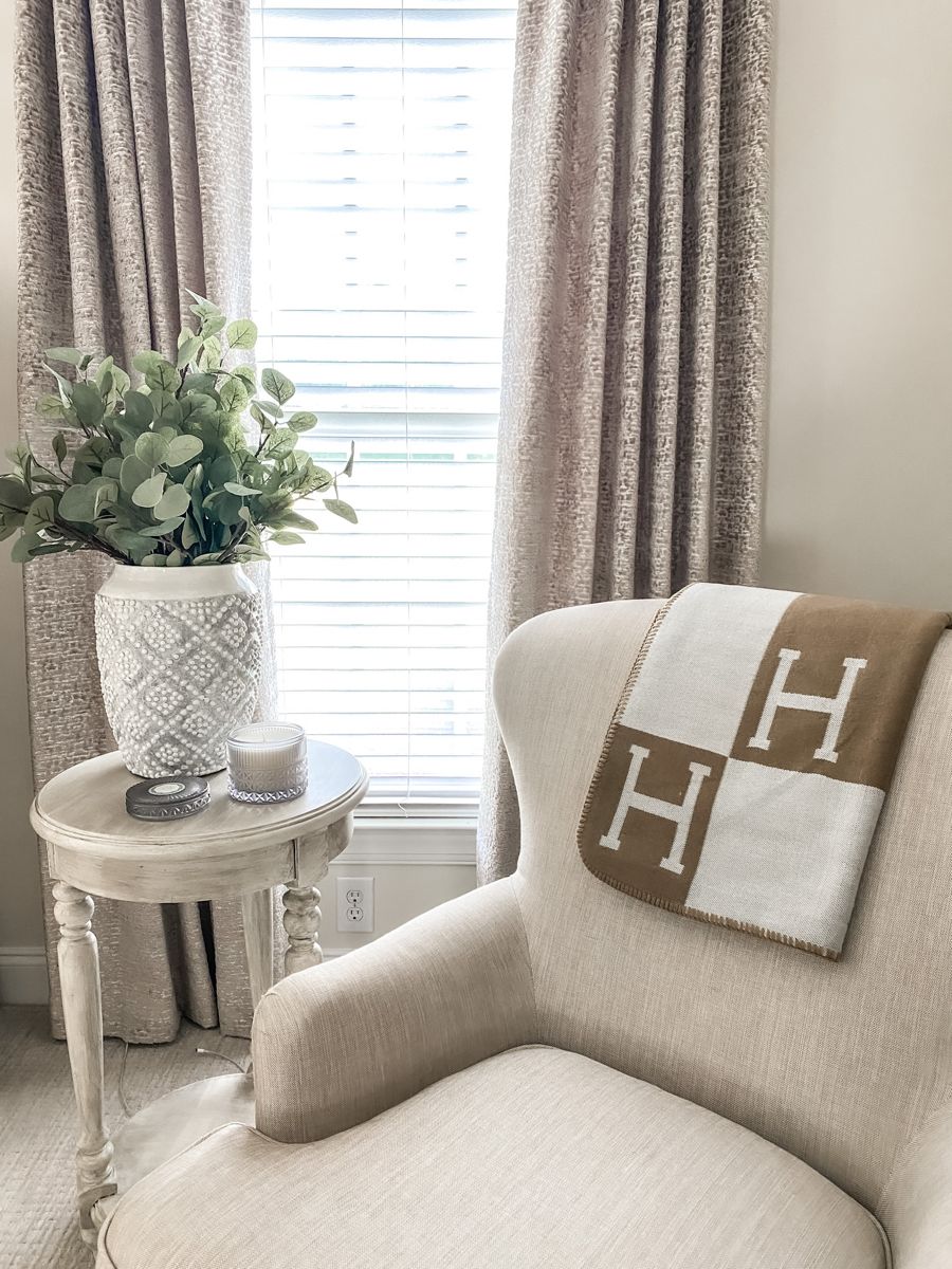 Plush gold cashmere throw, adding warmth and elegance to any room.