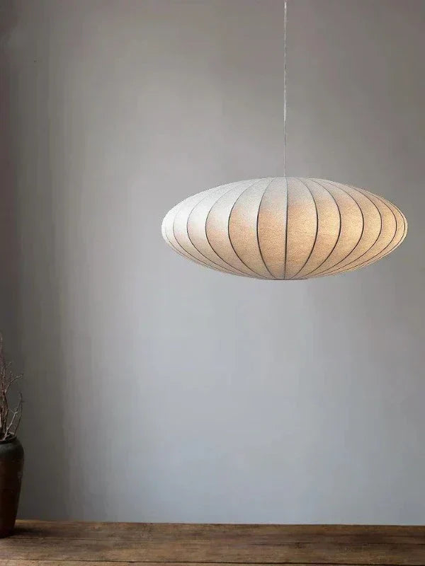 Luxury Silk Lumière crystal pendant lamp with elegant silk lampshade, perfect modern lighting for upscale home decor.