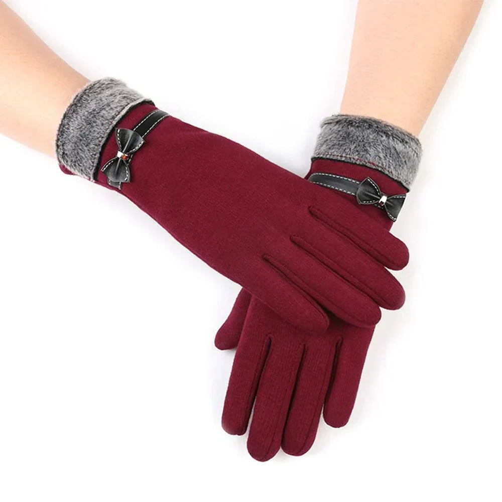 Fashionable women's warm gloves with touchscreen tech, essential winter accessory.