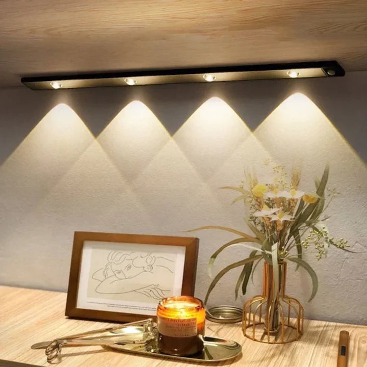 Modern kitchen lighting solution: LumiLux wireless, rechargeable LED cabinet light with motion sensor.