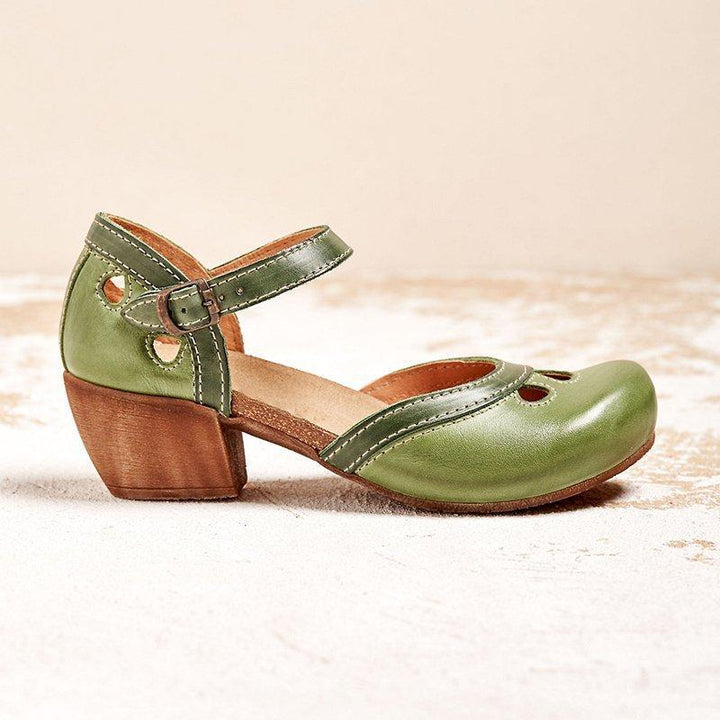 Classic two-tone Mary Jane block heels for women, featuring a round toe & comfy ankle strap.