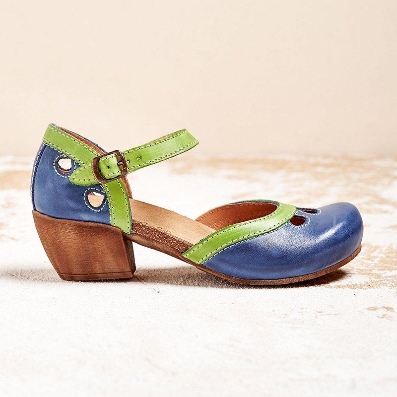 Vintage-inspired women's two-tone Mary Jane shoes with stable block heels, perfect for office or party.