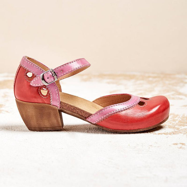 Elegant women's two-tone Mary Jane block heel shoes, a classic style with comfortable ankle strap.