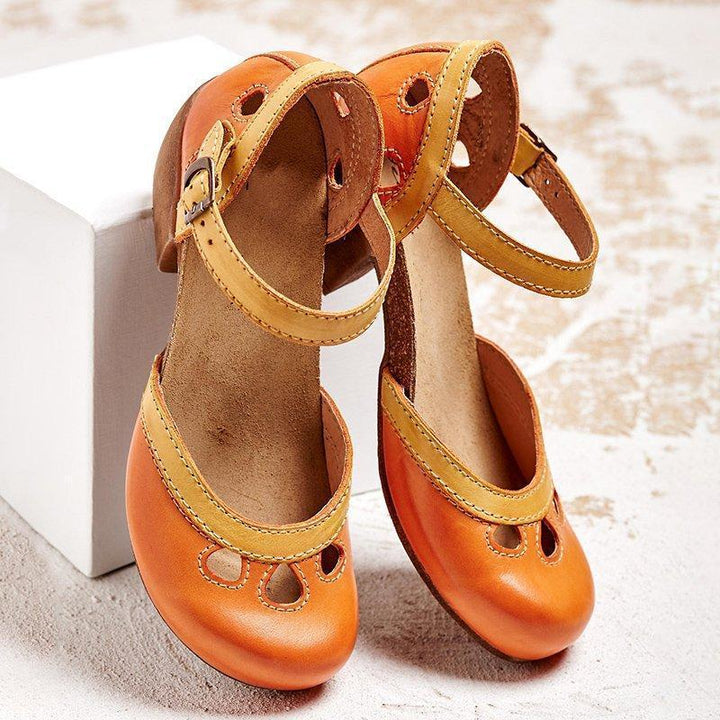 Fashionable women's two-tone Mary Jane block heel shoes, vintage inspired with an ankle strap.