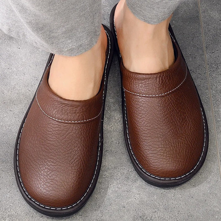 Men's Ergonomic Comfort House Slippers in a clog style, perfect for relaxed home wear.