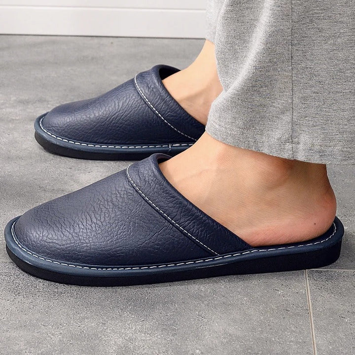 Men's indoor shoes: comfortable ergonomic house slippers with a timeless clog design.
