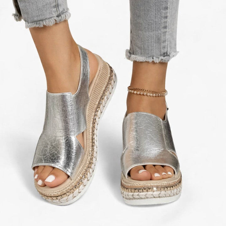 Women's metallic wedge sandals for supportive everyday comfort. Perfect summer and travel shoes with an open toe.