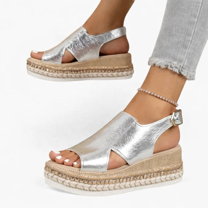 Comfortable women's metallic wedge sandals with an adjustable buckle, ideal for summer, travel, and everyday wear.