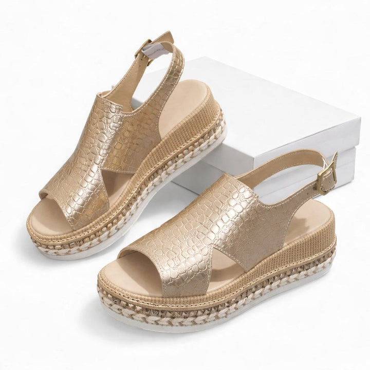 Fashionable metallic open-toe wedge sandals for women, designed for ultimate comfort and versatile everyday styling.