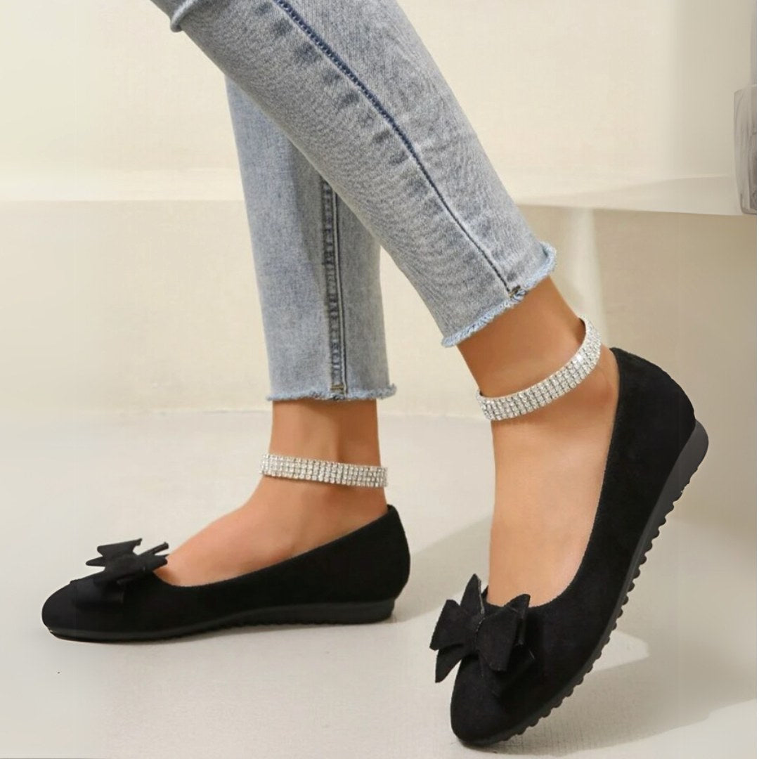Close-up of women's supportive orthopaedic shoes, showcasing cushioning for all-day comfort & foot support.