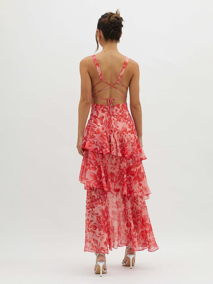Women's polished floral print tiered maxi dress with ruffles, ideal for elegant occasion wear and summer events.