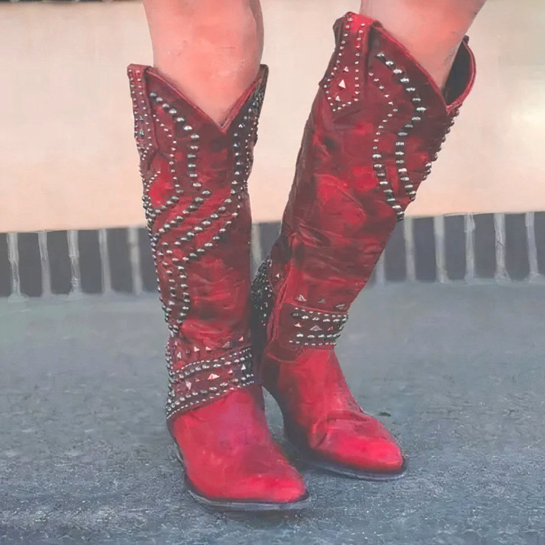 Supportive women's orthopedic knee-high boots. Features a sleek pointed toe and stable block heel for comfort and style.