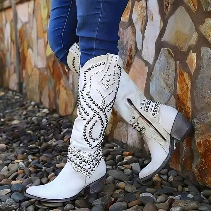 Comfortable women's knee-high boots with orthopedic support, pointed toe, and fashionable block heel. Perfect winter footwear.