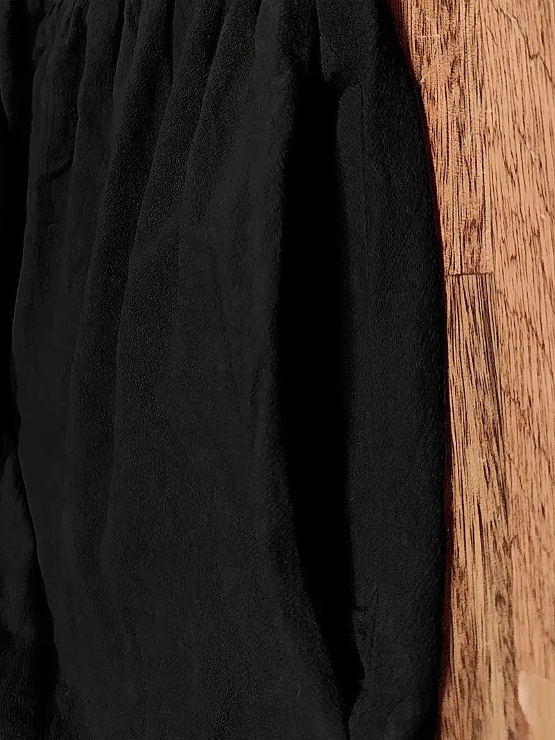 Elegant Madison midi dress for women, flowing and versatile, featuring useful pockets.