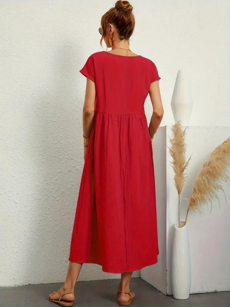 Everyday women's midi dress, Madison flowing design, with practical side pockets.