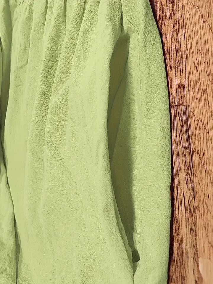 Versatile women's flowing midi dress with pockets, suitable for summer & fall fashion.