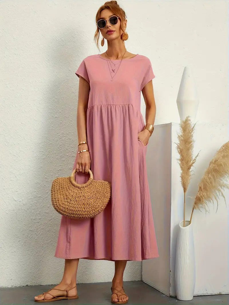 Casual women's summer midi dress, Madison style, with a flowing design & useful pockets.