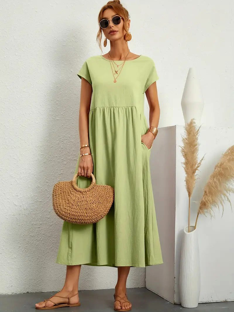 Everyday women's midi dress with a flowing skirt and essential pockets for convenience.