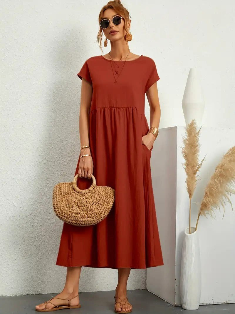 Stylish women's summer flowing midi dress, Madison design, with ample pockets.