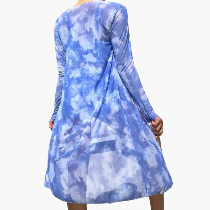Chic women's 3-piece beach cover up with vibrant swirl print. Includes kimono, crop top & shorts.