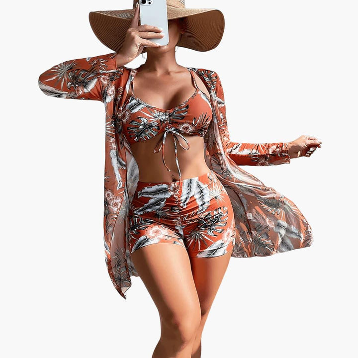 Elegant women's swirl print 3-piece beach set: kimono, crop top, high-waisted shorts for summer.