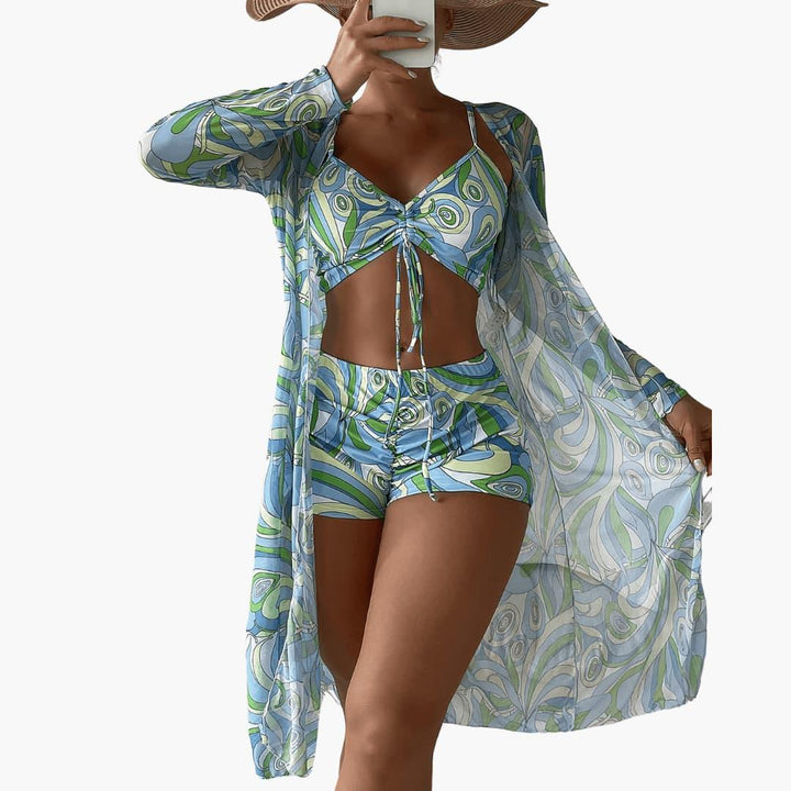 Women's high-waisted shorts, crop top & kimono 3-piece beach cover up set, vibrant swirl print.